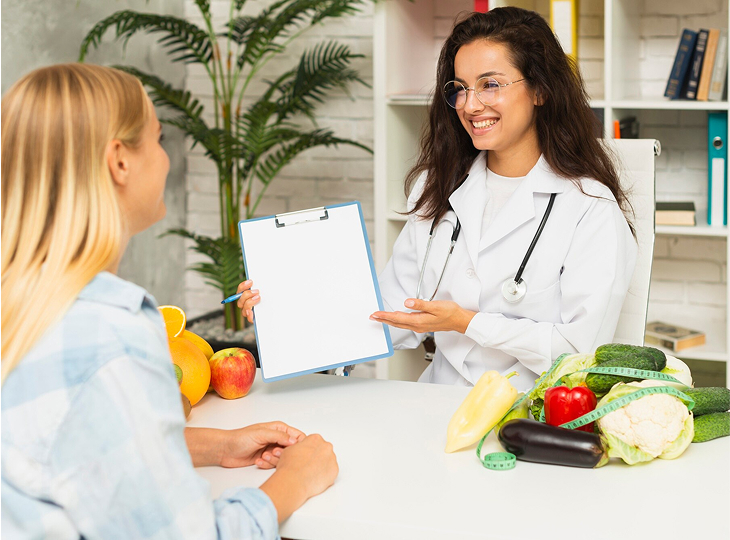Medium shot doctor showing results to patient